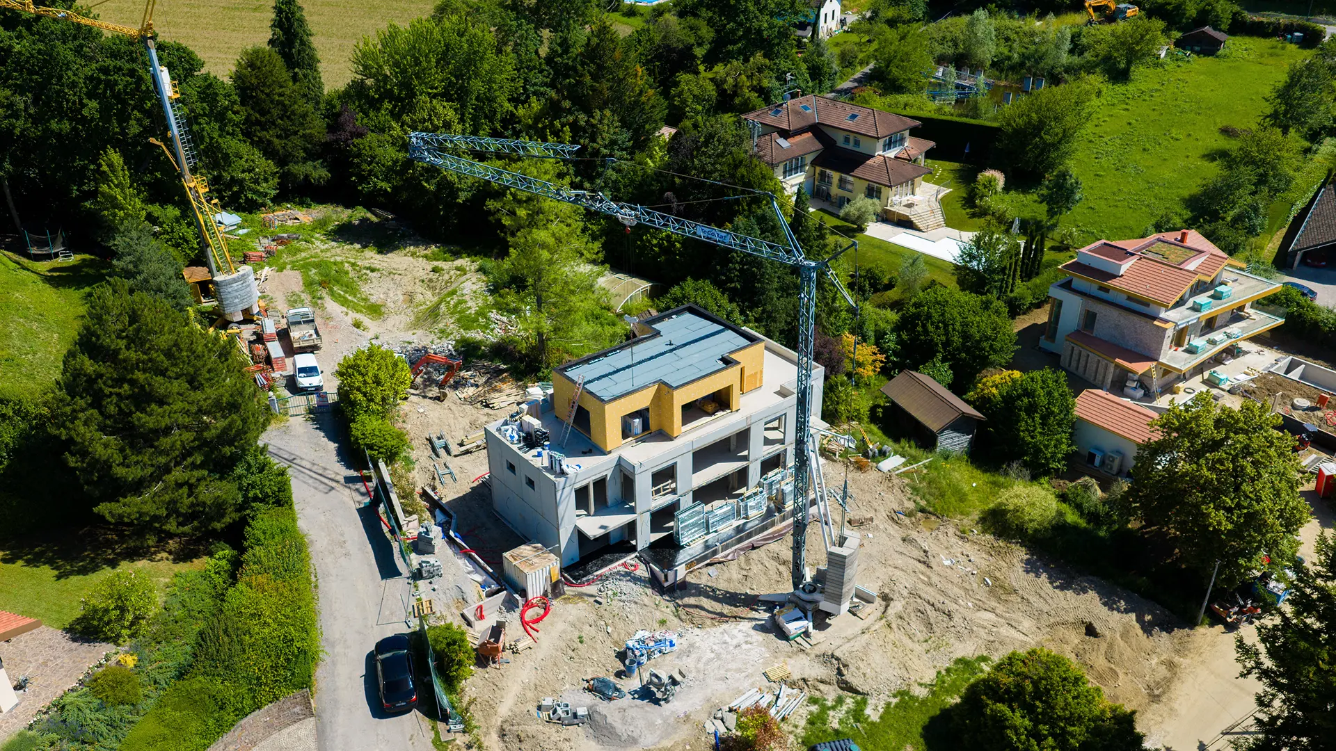 Ossature bois en hauteur sur bâtiment, chantier de Chens-sur-Léman — vue drone
